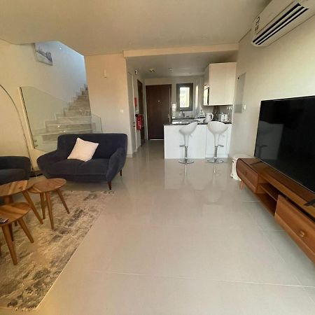 Sifa Beachfront Apartment Muskat Eksteriør bilde