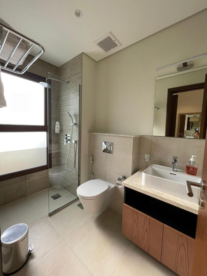 Sifa Beachfront Apartment Muskat Eksteriør bilde
